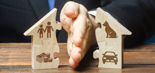 hand dividing puzzle pieces